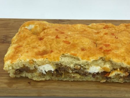 Cross section view of the biscuit cake showing the sausage and cheese